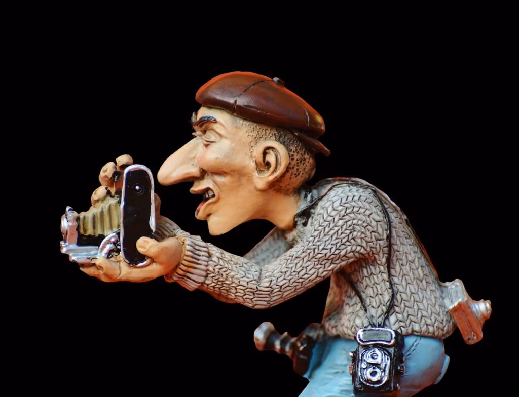 A blurred image of a celebrity couple walking quickly, shielding themselves from paparazzi, symbolizing privacy.