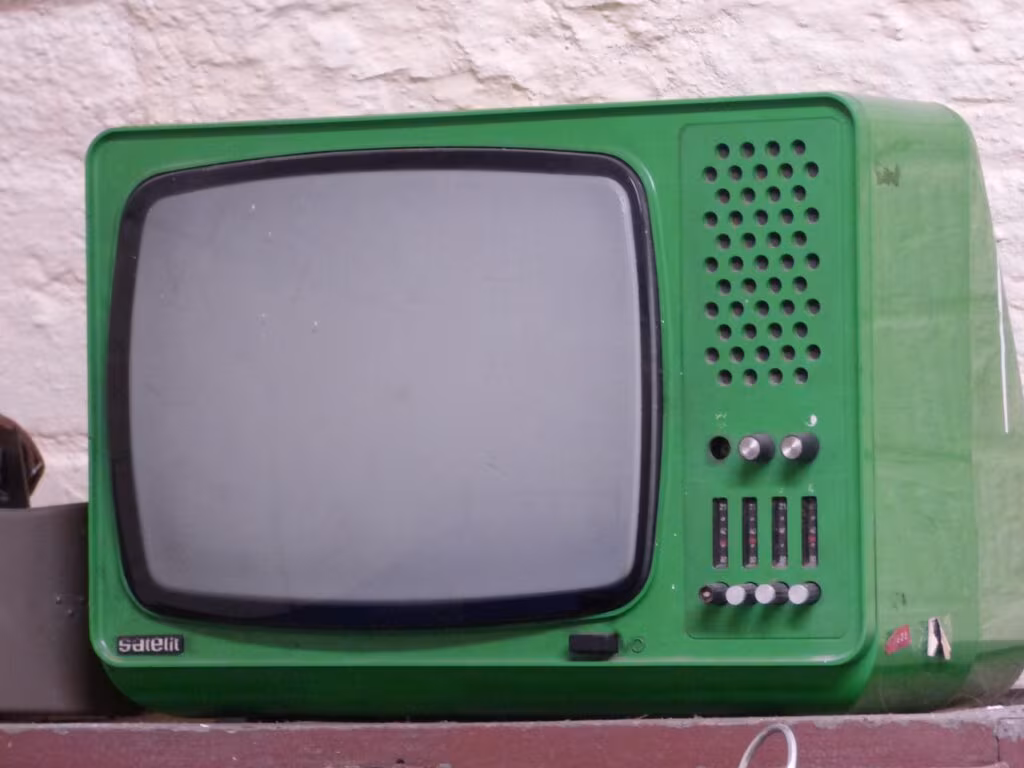 A young actor on a television set, representing the experience of child performers in the 1990s.