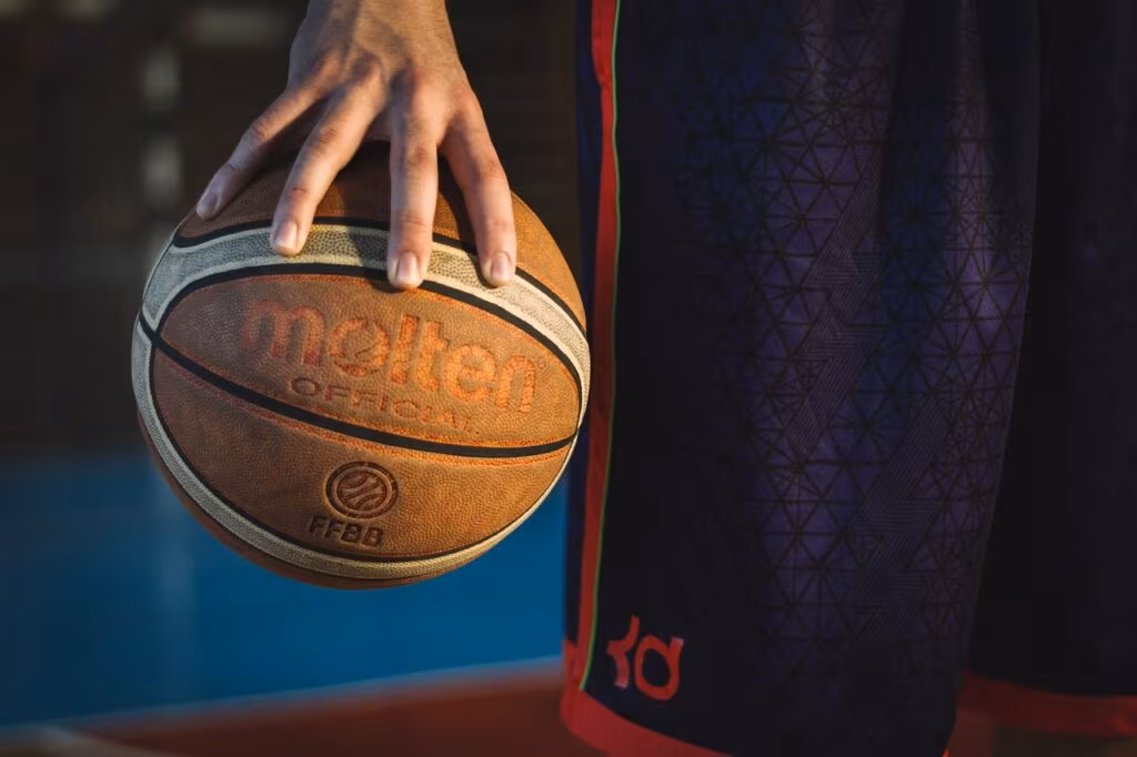 Fast break action on an NBA court during a high-scoring game.