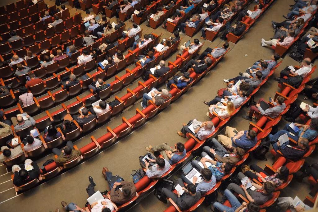International diplomats meeting at a conference table to discuss nuclear policy