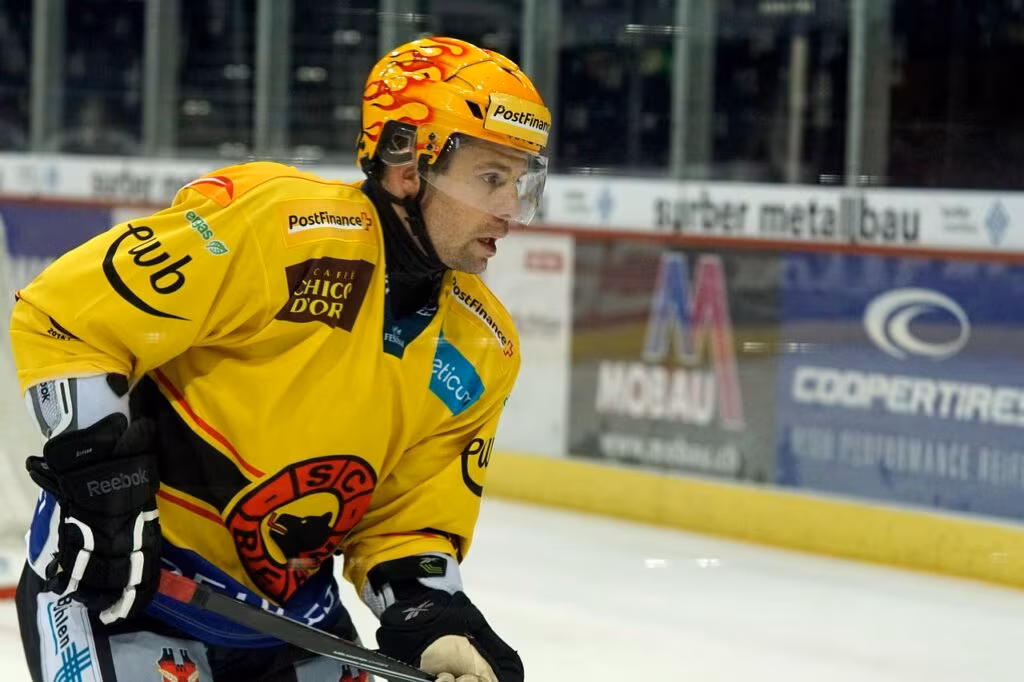 NHL player Brad Marchand coaching a youth hockey team on the ice in Halifax