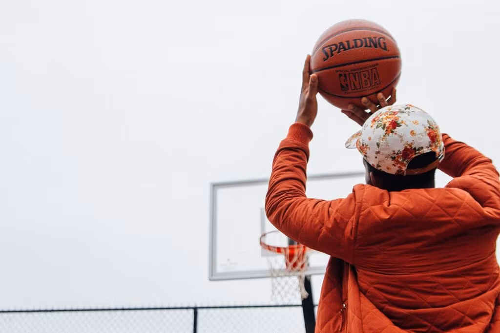 Professional women's basketball players competing in a 3-on-3 league game on a specialized court.