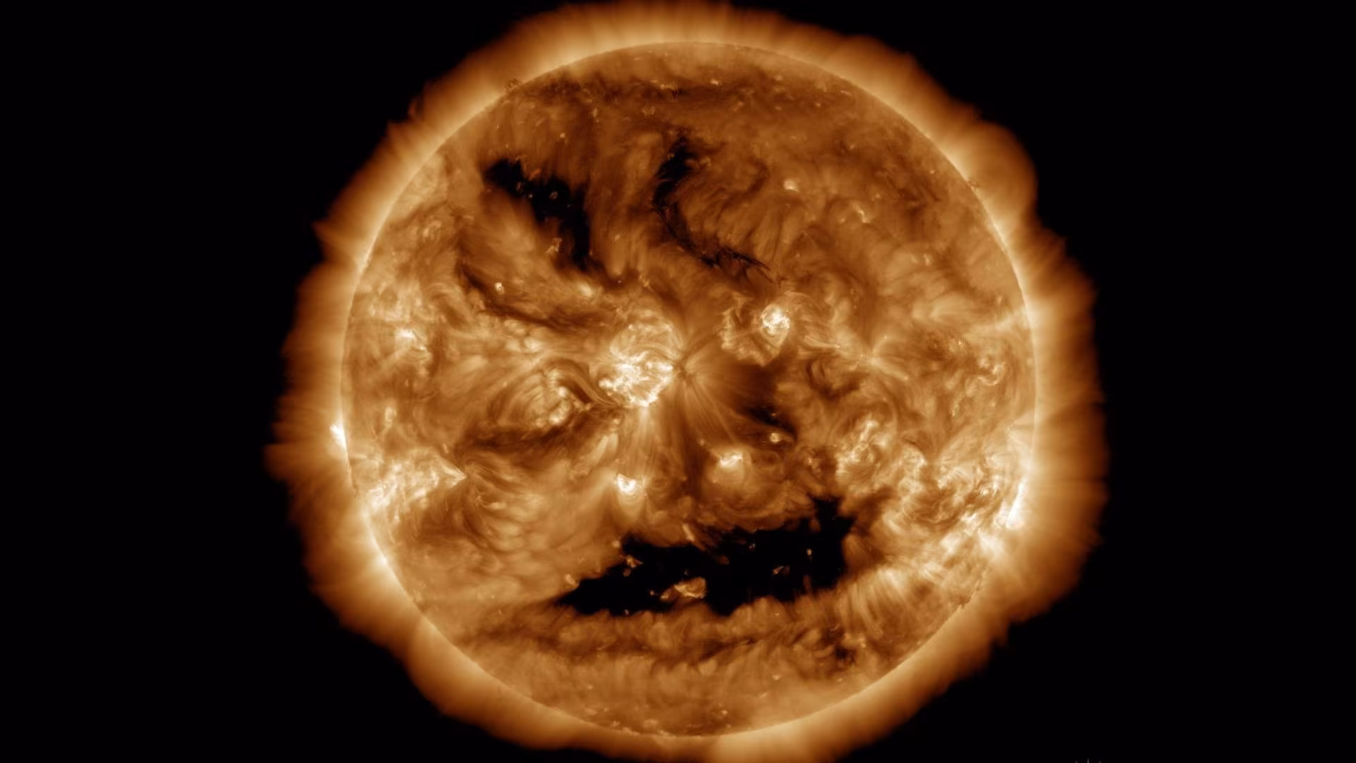 NASA spots a spooky face glowing on the sun just in time for Halloween (photo) - Space