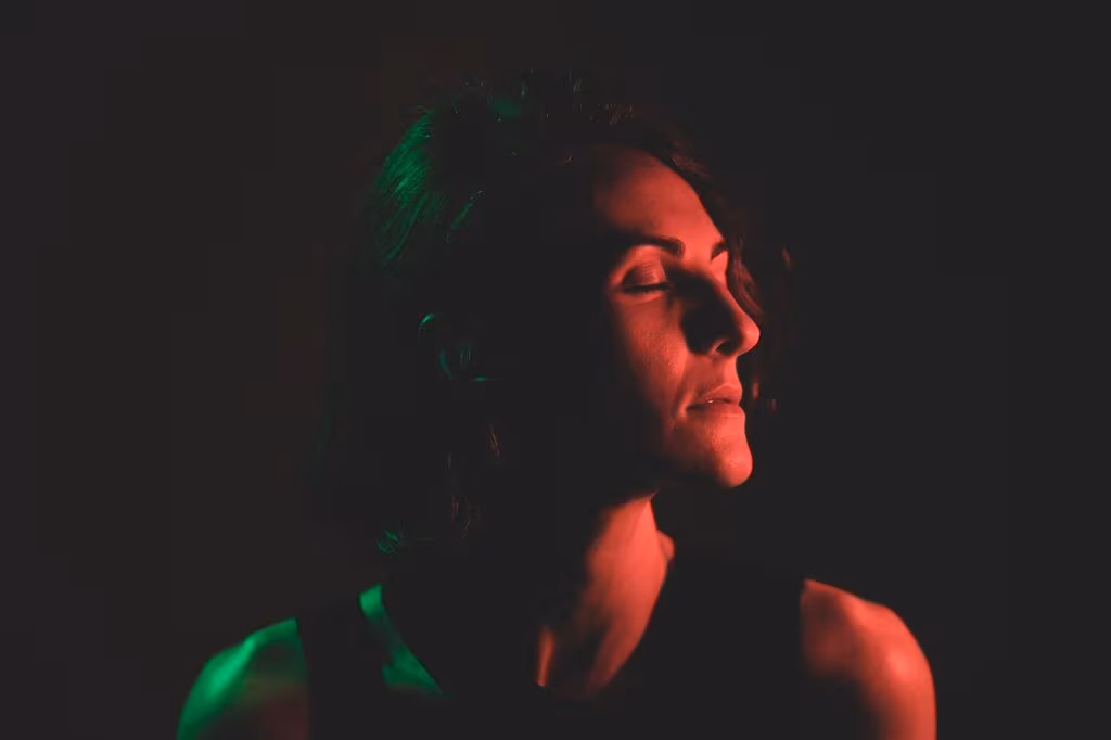 A black and white portrait of a distinguished man with intense eyes, reflecting the dramatic roles Udo Kier often played.