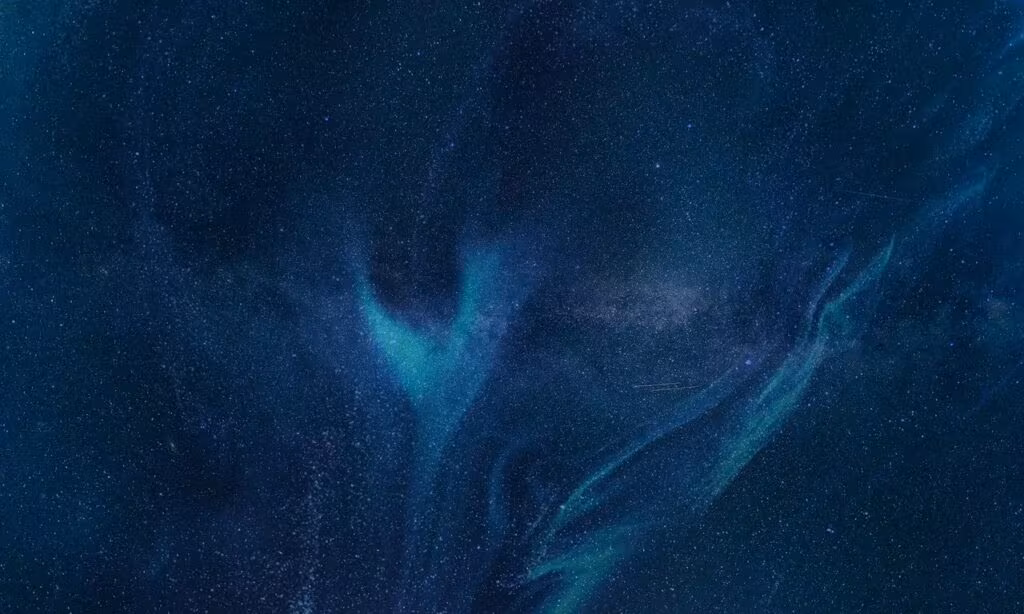 A fleet of futuristic spaceships flying through a nebula, reminiscent of Mass Effect starships.