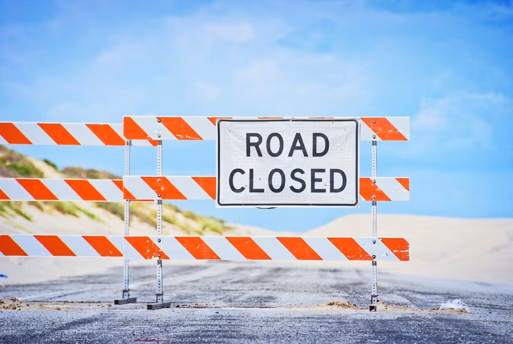 A generic public health warning sign emphasizing safety and reporting unusual animal behavior.