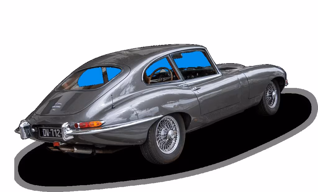 A vintage street scene in a small American town, reflecting the 1960s setting of Welcome to Derry.