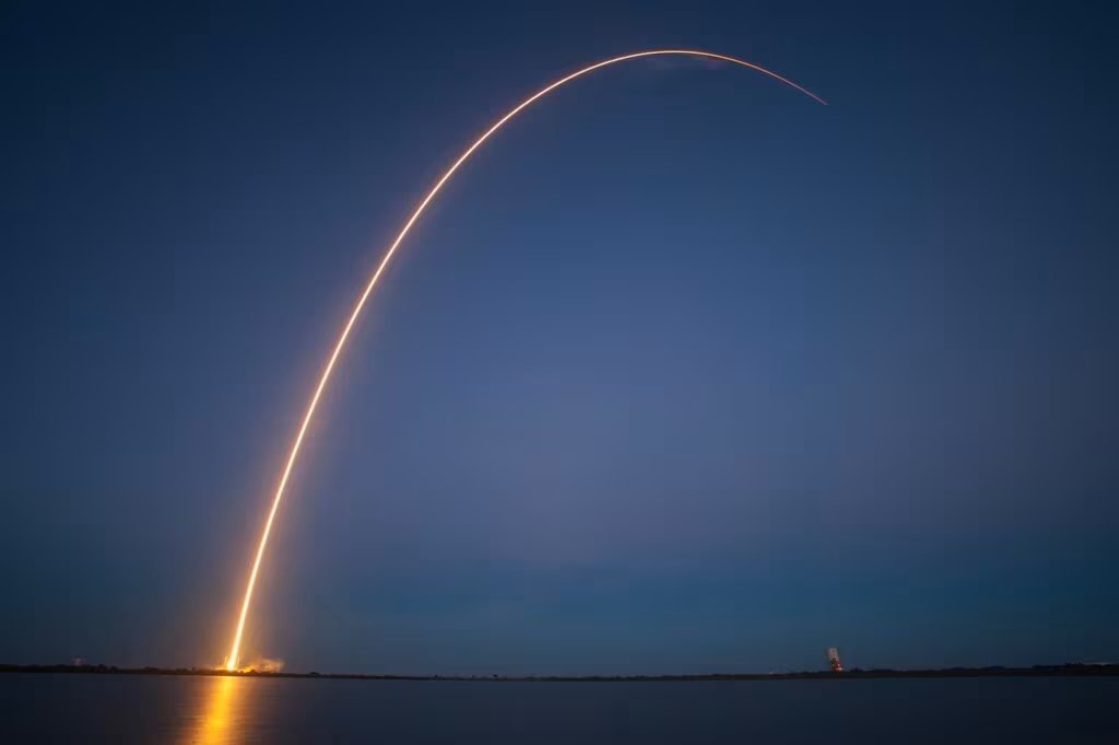 Conceptual diagram showing a spacecraft trajectory from Earth to Mars through the solar system