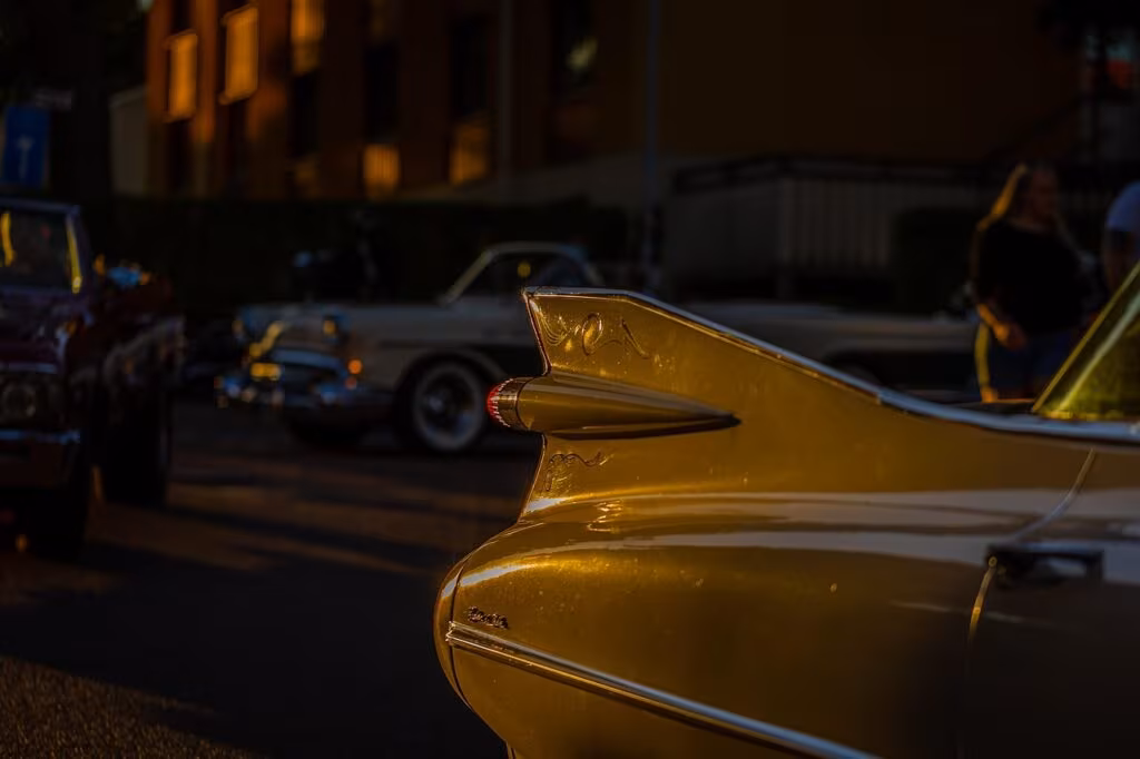 Exterior of a classic American diner with a neon sign, early morning light