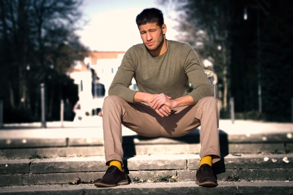 Ian Machado Garry celebrating a victory inside the UFC Octagon cage