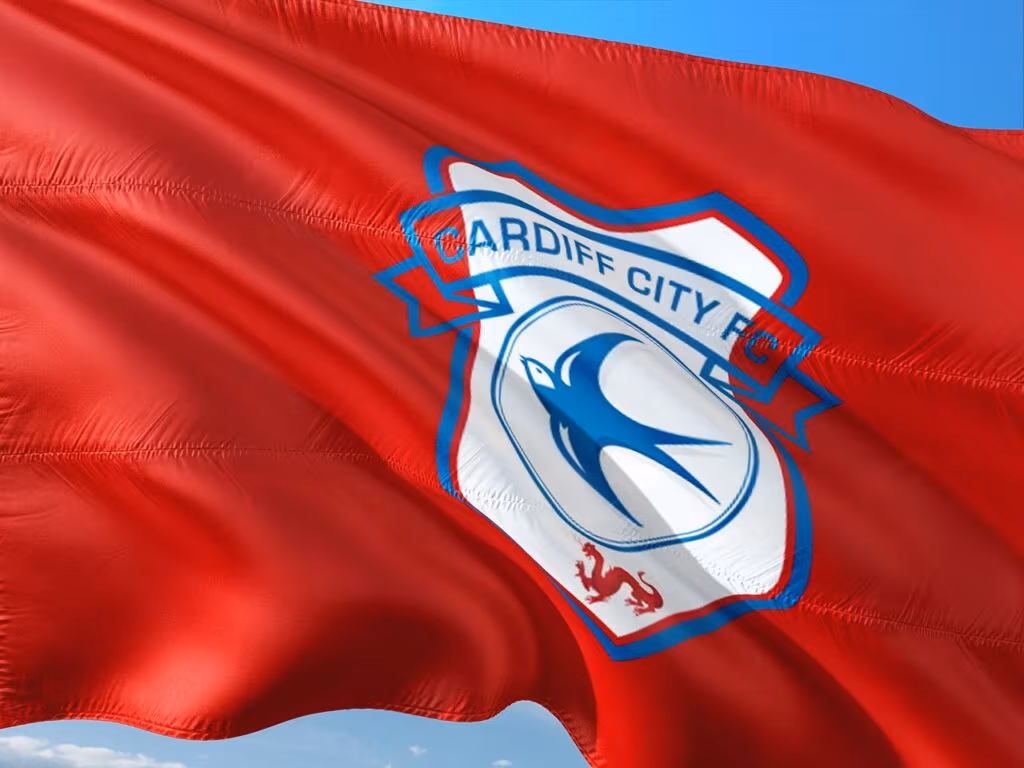 Jérémy Doku dribbling past defenders during a Premier League match for Manchester City