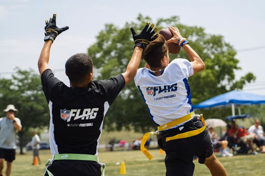 Los Angeles Rams quarterback Matthew Stafford throwing a pass during a game, demonstrating offensive execution.