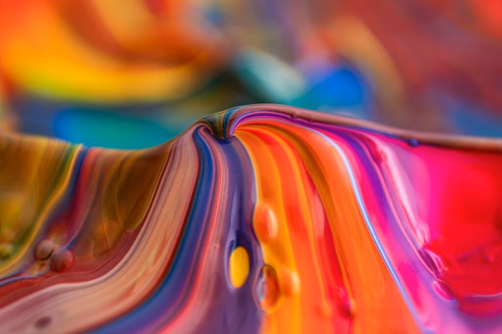 Microscopic view of an ancient ochre fragment showing distinct wear patterns and striations.