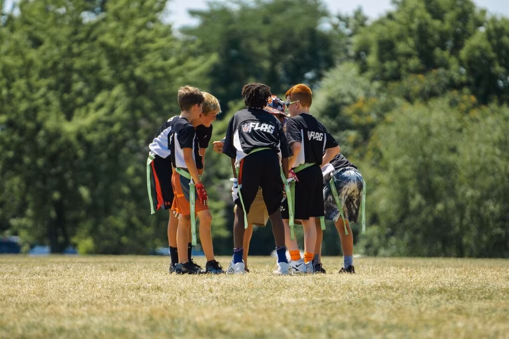 NFL referee throwing a penalty flag for unsportsmanlike conduct