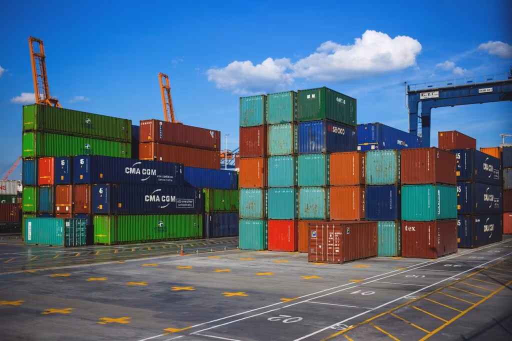 Rows of organized shelves in a large logistics warehouse, symbolizing the infrastructure needed to support thousands of simultaneous deals.