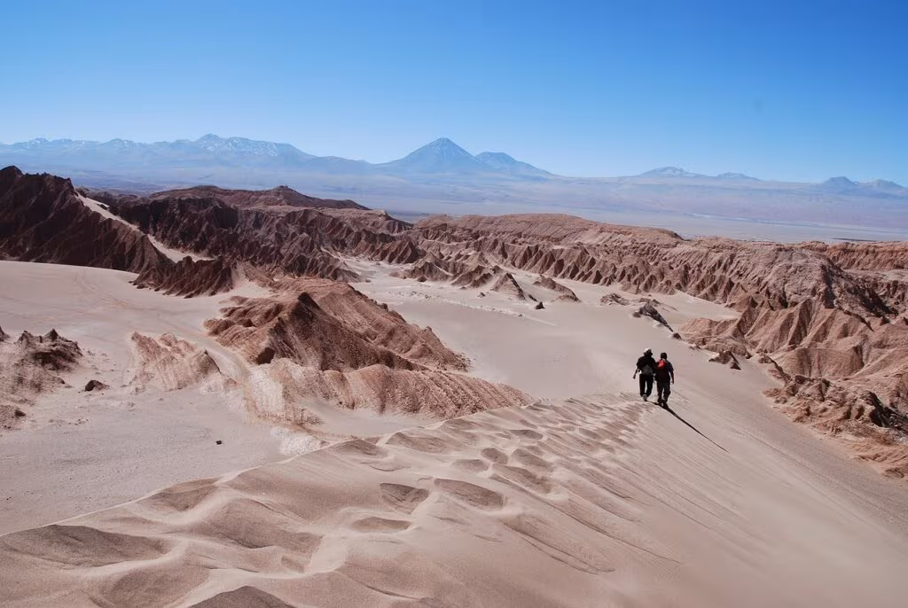 The Atacama Cosmology Telescope (ACT) dish against a clear sky in the Chilean desert