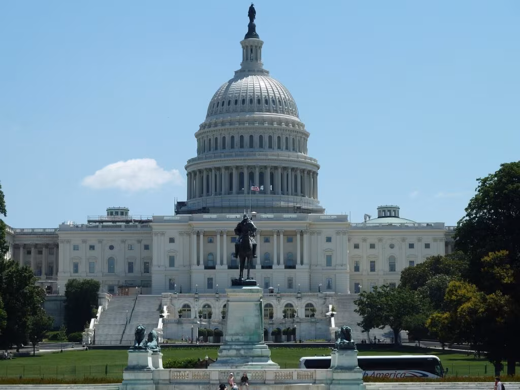 US Capitol Building with a somber atmosphere, symbolizing a government shutdown.