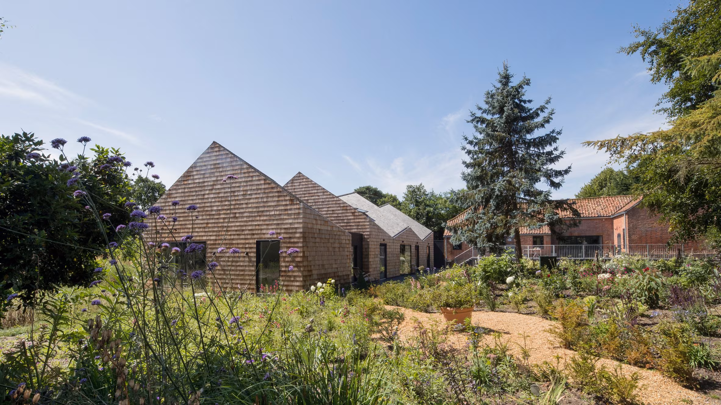 Seven scaly-looking houses that are sheathed in shingles - Dezeen