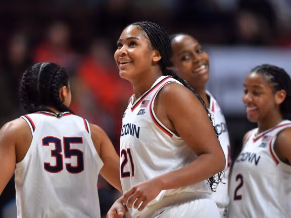 UConn's narrow victory keeps them No. 1 in women's AP Top 25, South Carolina, UCLA and Texas next - AP News